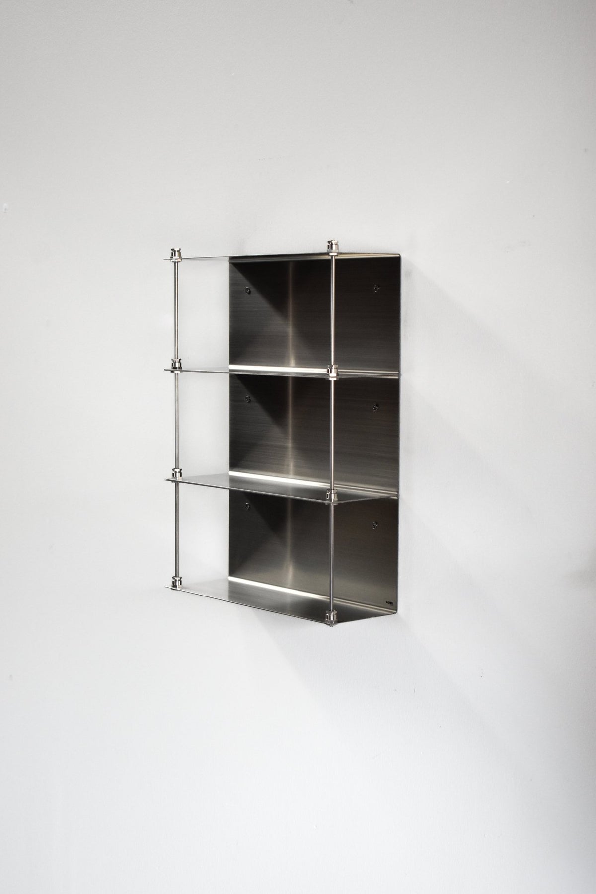 Steel shelving unit SIGTUNA in brushed stainless steel by Acier Studio